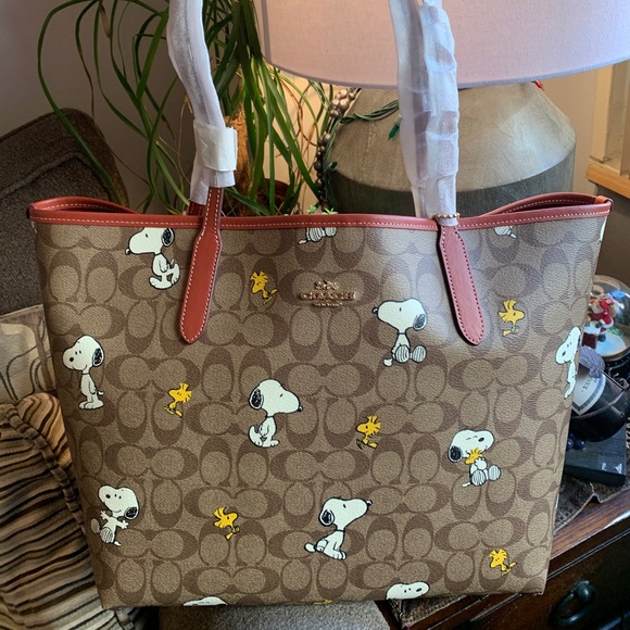 Coach Handbags - Authentic COACH Signature Coated canvas/smooth leather Snoopy print snap Tote